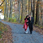 Andy and Thu walking through the woods