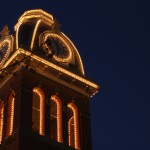 the clock tower on Woodburn Hall, WVU, winter of 2005, with the old lights highlighting edges... those lights were replaced by spotlights