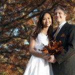 Andy and Thu, wedding portrait under an oak during Fall