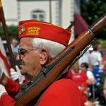 Marine veteran marching in Grafton Memorial Day parade